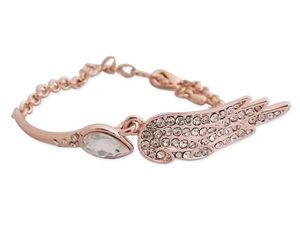 WHITE LABEL - bracelet doré scintillant avec aile d'ange bijou  - Collier